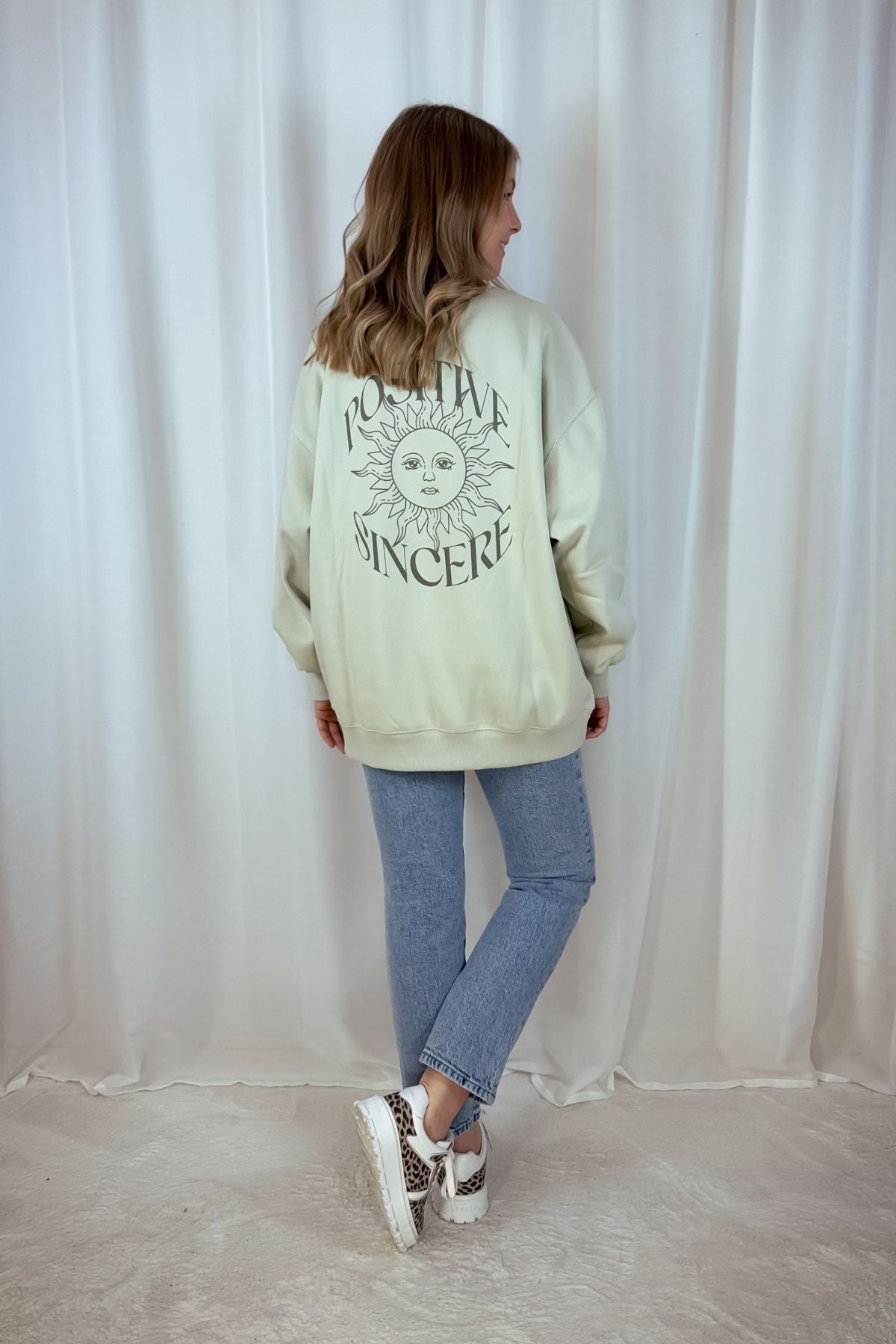 Sweater Positive - grün